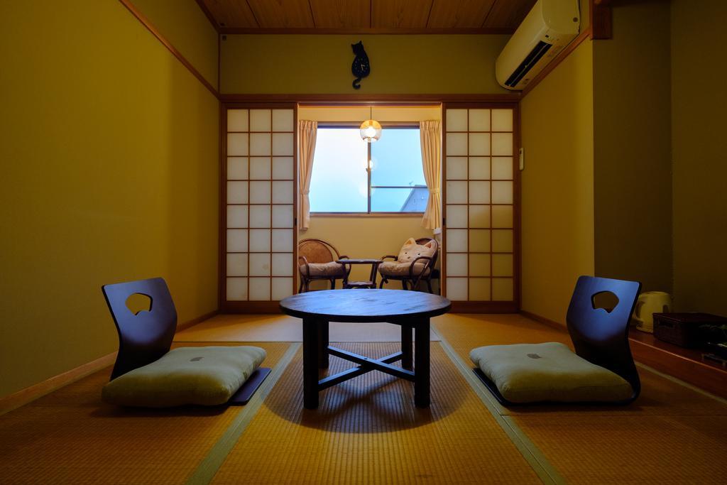 Waraneko No Yado Hotel Yufu Kamer foto